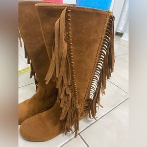 Tall fringe boots